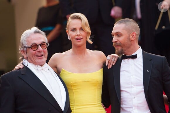 George Miller, Charlize Theron, Tom Hardy - Montée des marches du film "Mad Max : Fury Road" lors du 68e Festival International du Film de Cannes le 14 mai 2015.