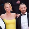 George Miller, Charlize Theron, Tom Hardy - Montée des marches du film "Mad Max : Fury Road" lors du 68e Festival International du Film de Cannes le 14 mai 2015.