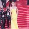 Charlize Theron en Christian Dior couture - Montée des marches du film "Mad Max : Fury Road" lors du 68e Festival International du Film de Cannes le 14 mai 2015