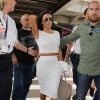 Eva Longoria arrive à l'aéroport de Nice, habillée d'un top et d'une jupe perforés Twenty et de souliers Christian Louboutin. Le 14 mai 2015.