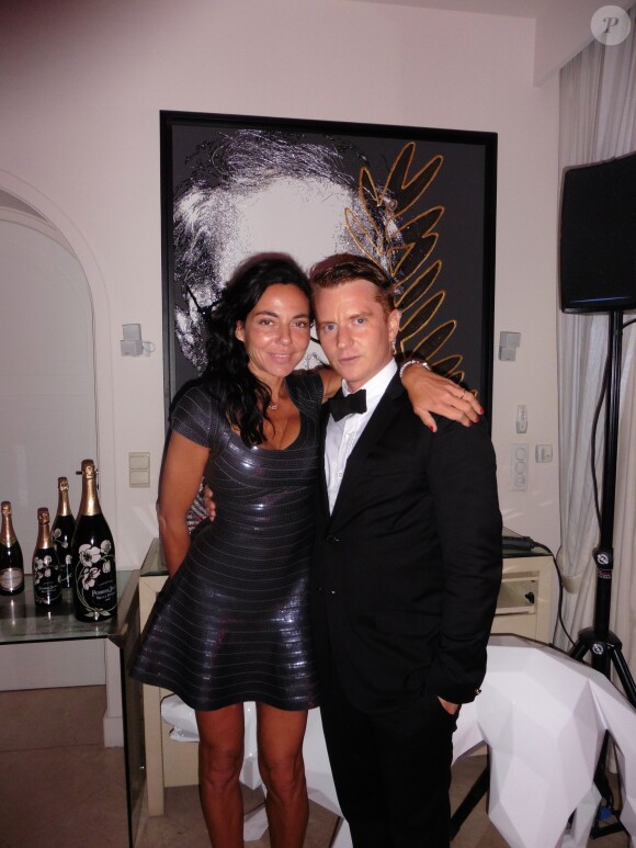 Exclusif - Sandra Zeitoun de Matteis et Justin Daly pose lors d'une soirée à la suite Sandra and Co au 63 la Croisette à Cannes, le 19 mai 2015.