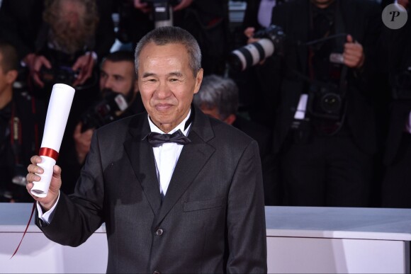 Hou Hsiao-hsien (Palme de la mise en scène pour le film "The Assassin") - Photocall de la remise des palmes du 68e Festival du film de Cannes le 24 mai 2014