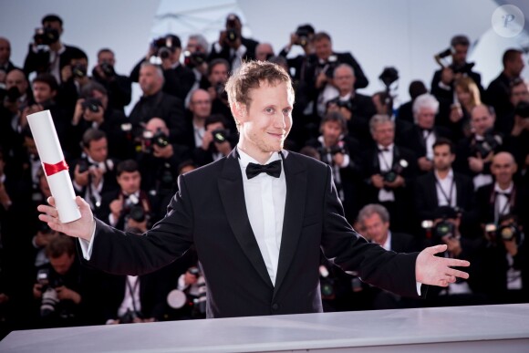 László Nemes (Grand Prix pour le film Le Fils de Saul) - Photocall de la remise des palmes du 68e Festival du film de Cannes le 24 mai 2014