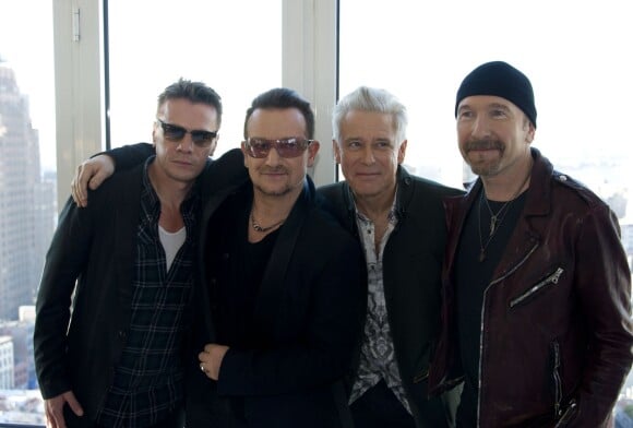 Larry Mullen, Jr., Bono, Adam Clayton et The Edge - Le groupe U2 lors d'une conférence de presse pour presenter la musique du film "Mandela, longue marche vers la Liberte" au Mondrian Soho a New York, le 7 decembre 2013.