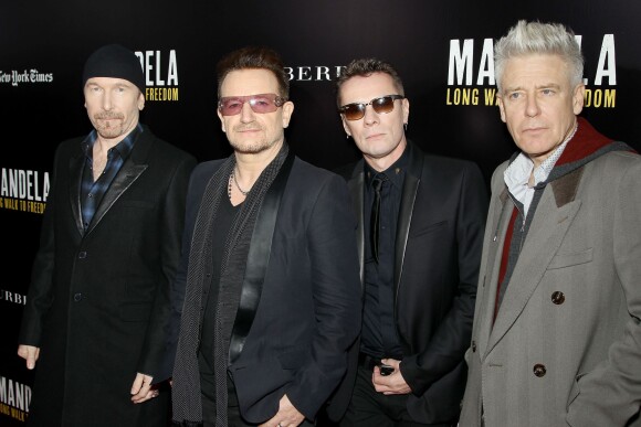 The Edge, Bono, Larry Mullen Jr. et Adam Clayton de U2 à New York, le 25 novembre 2013.