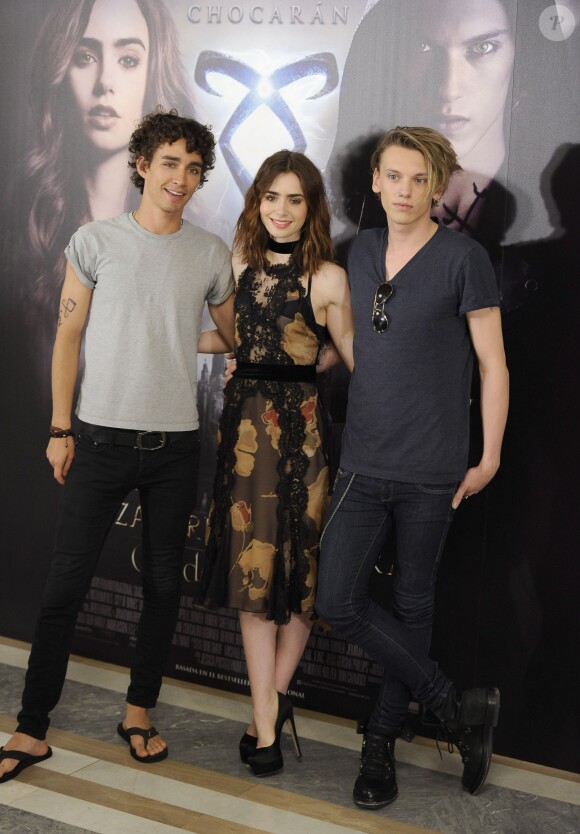 Robert Sheehan, Lily Collins et Jamie Campbell Bower - Photocall du film "The Mortal Instruments: City of Bones" a Madrid, le 22 aout 2013.