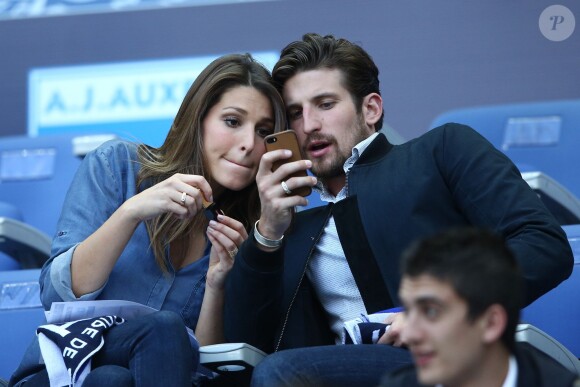 Laury Thilleman et son compagnon Nicolas Tesic au Stade de France le 30 mai 2015 pour la finale de la Coupe de France PSG-Auxerre (1-0).
