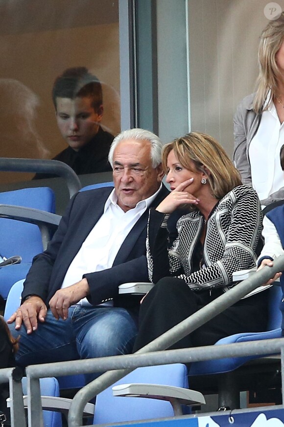 Dominique Strauss-Kahn et sa compagne Myriam L'Aouffir au Stade de France le 30 mai 2015 pour la finale de la Coupe de France PSG-Auxerre (1-0).