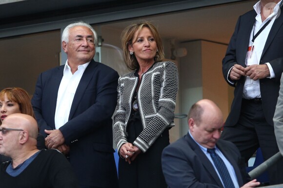 Dominique Strauss-Kahn et sa compagne Myriam L'Aouffir au Stade de France le 30 mai 2015 pour la finale de la Coupe de France PSG-Auxerre (1-0).