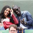 Mamadou Sakho et sa femme Majda, enceinte, à Roland-Garros à Paris le 31 mai 2015.