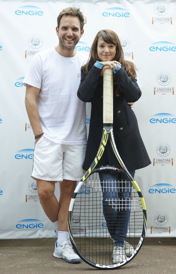 Christophe Michalak et Delphine McCarthy, lors du premier jour du 23e Trophée des personnalités Roland Garros, à Paris, le mardi 2 juin 2015.