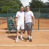 Jean-Philippe Doux et Denis Charvet, lors du premier jour du 23e Trophée des personnalités Roland Garros, à Paris, le mardi 2 juin 2015.