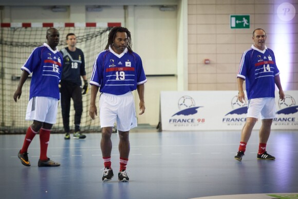 Lilian Thuram, Christian Karembeu et Alain Boghossian lors d'un match de gala avec France 98 pour l'Academie Bernard Diomède à Issy-les-Moulineaux, le 1er juin 2015. 