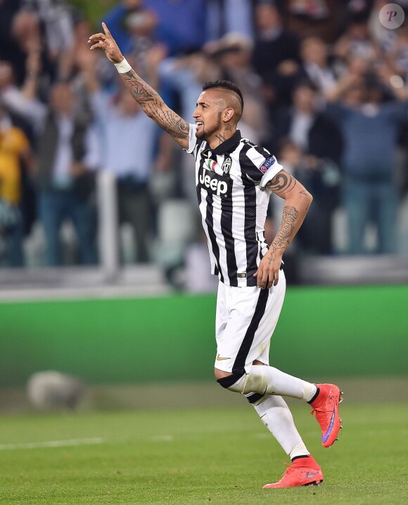 Juventus' Arturo Vidal jubilates after scoring on penalty the goal during the UEFA Champions League Quarter Final soccer match, Juventus FC Vs Monaco FC at the Juventus Stadium in Turin, Italy on April 14, 2015. Photo by Di Marco/ANSA/ABACAPRESS.COM15/04/2015 - Turin