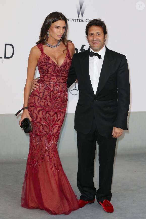 Claudia Galanti et Arnaud Mimran lors de la soirée "AmfAR's 21st Cinema Against AIDS" à l'Eden Roc au Cap d'Antibes lors du 67e festival du film de Cannes, le 22 mai 2014