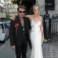 Johnny Hallyday et sa femme Laeticia Hallyday arrivent à la soirée "Vogue Paris Foundation Gala" au palais Galliera à Paris, le 6 juillet 2015.