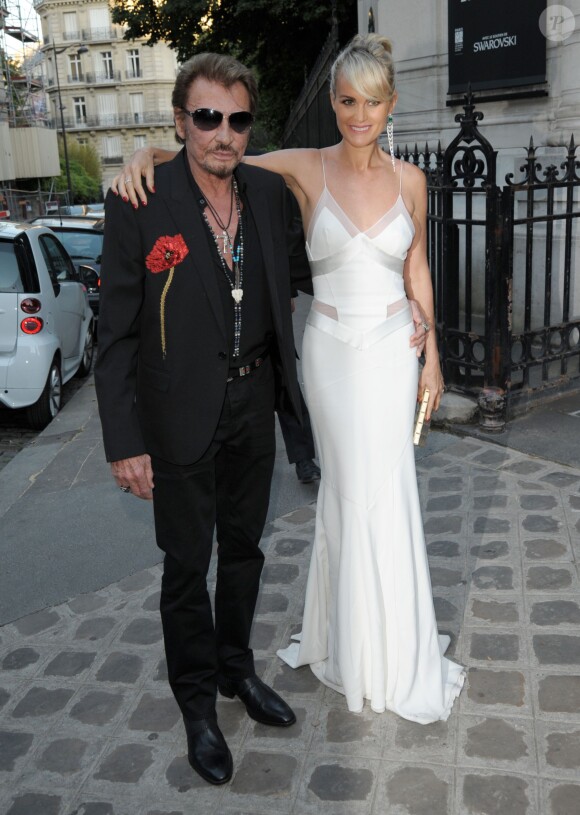 Johnny Hallyday et sa femme Laeticia Hallyday arrivent à la soirée "Vogue Paris Foundation Gala" au palais Galliera à Paris, le 6 juillet 2015.