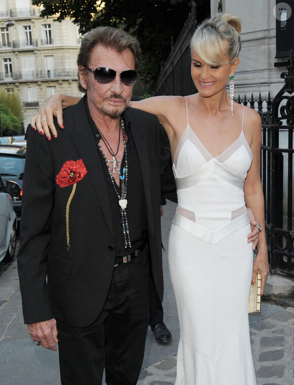 Johnny Hallyday et sa femme Laeticia Hallyday arrivent à la soirée "Vogue Paris Foundation Gala" au palais Galliera à Paris, le 6 juillet 2015.