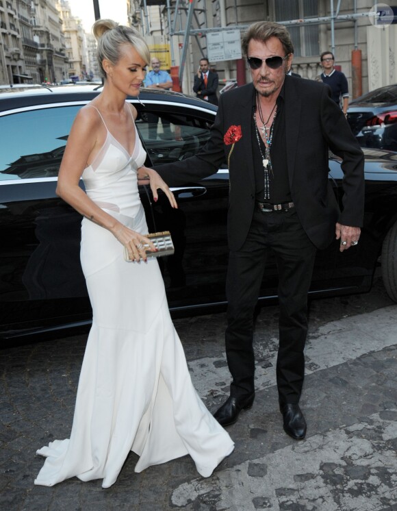 Johnny Hallyday et sa femme Laeticia Hallyday arrivent à la soirée "Vogue Paris Foundation Gala" au palais Galliera à Paris, le 6 juillet 2015.