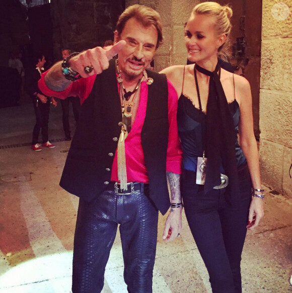 Johnny Hallyday et Laeticia, après le concert aux arènes de Nîmes, le 2 juillet 2015.