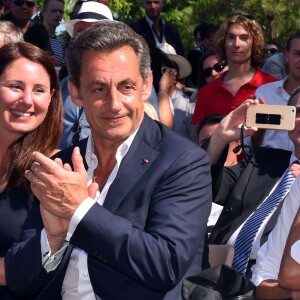 Nicolas Sarkozy avec sa femme Carla participent à une rencontre avec Les Républicains au jardin Albert 1er à Nice le 19 juillet 2015.