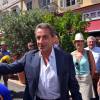 Nicolas Sarkozy avec sa femme Carla et Maud Fontenoy sont dans les rues de Nice après avoir déjeuné au restaurant "La Petite Maison" et avant de rencontrer les élus et les militants Républicains au jardin Albert 1er le 19 juillet 2015.