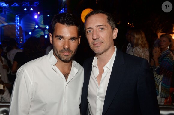 Exclusif - Antoine Chevanne (propriétaire du Byblos) et Gad Elmaleh - Soirée "Summer Party" au club Le Byblos à Saint-Tropez, le 16 juillet 2015.
