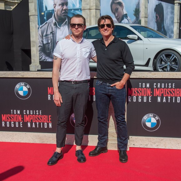 Simon Pegg et Tom Cruise - Première du film "Mission Impossible - Rogue Nation" à Vienne en Autriche le 23 juillet 2015.