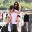 L'actrice Nina Dobrev et son nouveau compagnon Austin Stowell sur la plage à Saint-Tropez le 24 juillet 2015.