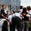 Roberto Merhi de l'écurie Manor Marussia F1 avec Mélanie Bianchi lors de l'hommage rendu à Jules Bianchi au Grand Prix de Hongrie, le 26 juillet 2015 à Mogyoród