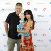 Alec Baldwin, sa femme Hilaria Thomas et leur fille Carmen Baldwin à l'événement caritatif "Ovarian Cancer Research Fund's Super Saturday" à Water Mill le 25 juillet 2015.