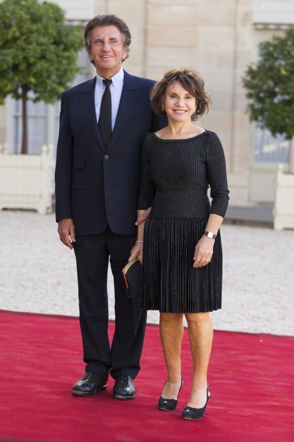 Jack Lang et sa femme Monique arrivant à un dîner officiel au palais de l'Elysée à Paris, le 23 juin 2014.