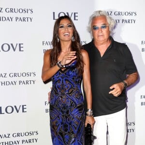 Elisabetta Gregoraci et son mari Flavio Briatore - Soirée d'anniversaire "Love" pour les 63 ans de Fawaz Gruosi à l'hôtel Cala di Volpe à Porto Cervo, le 9 août 2015. 