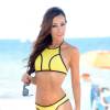 La sexy Lisa Opie, habillée d'un bikini de sa marque Vizcaya, profite d'un après-midi ensoleillé sur la plage à Miami, le 11 août 2015.