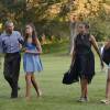 Le président Barack Obama, Michelle Obama et leurs filles Sasha et Malia rentrent à la Maison Blanche après des vacances à Martha's Vineyard. Washington, le 23 août 2015.