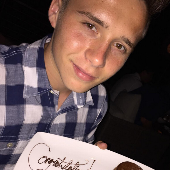Brooklyn Beckham, félicité par ses parents après obtention de son bac. Photo publiée le 23 août 2015.