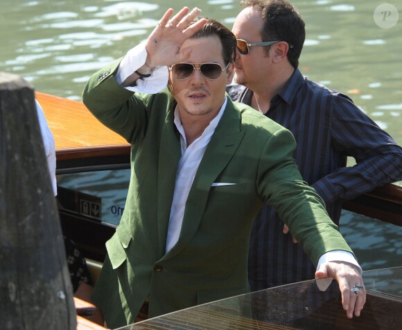 Johnny Depp, Scott Cooper et Dakota Johnson au 72e festival international du film de Venise , la Mostra, le 4 septembre 2015