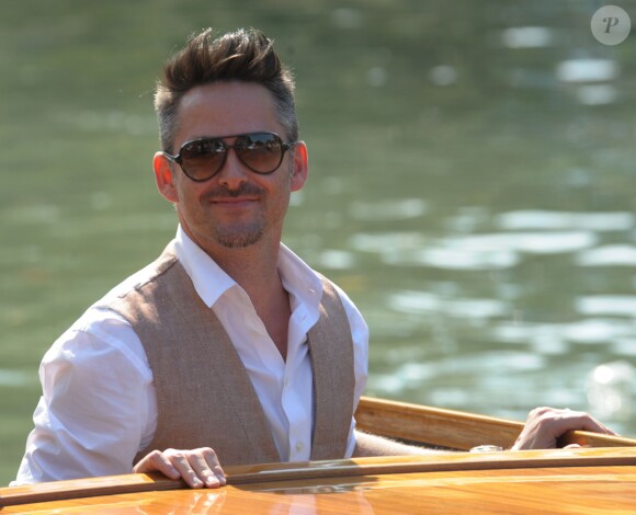 Johnny Depp, Scott Cooper et Dakota Johnson au 72e festival international du film de Venise , la Mostra, le 4 septembre 2015.