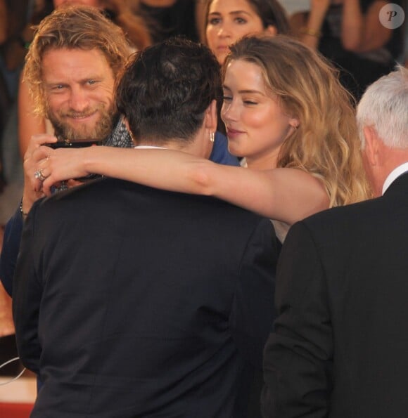Johnny Depp et sa femme Amber Heard - Tapis rouge du film Black Mass (Strictly Criminal) lors du 72ème festival du film de Venise (la Mostra), le 4 septembre 2015.