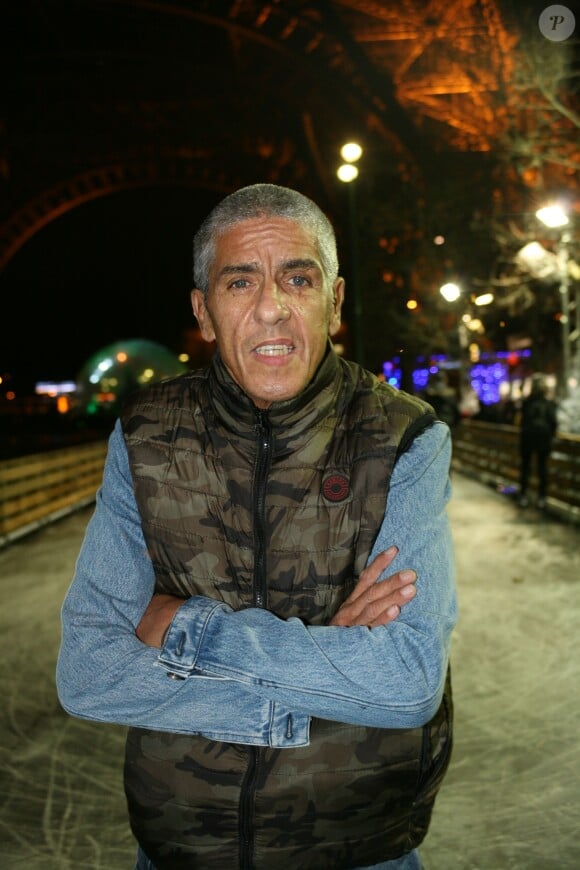 Samy Naceri présent à l'inauguration des chalets de Noël et de la patinoire de la Tour Eiffel à Paris, le 19 décembre 2014