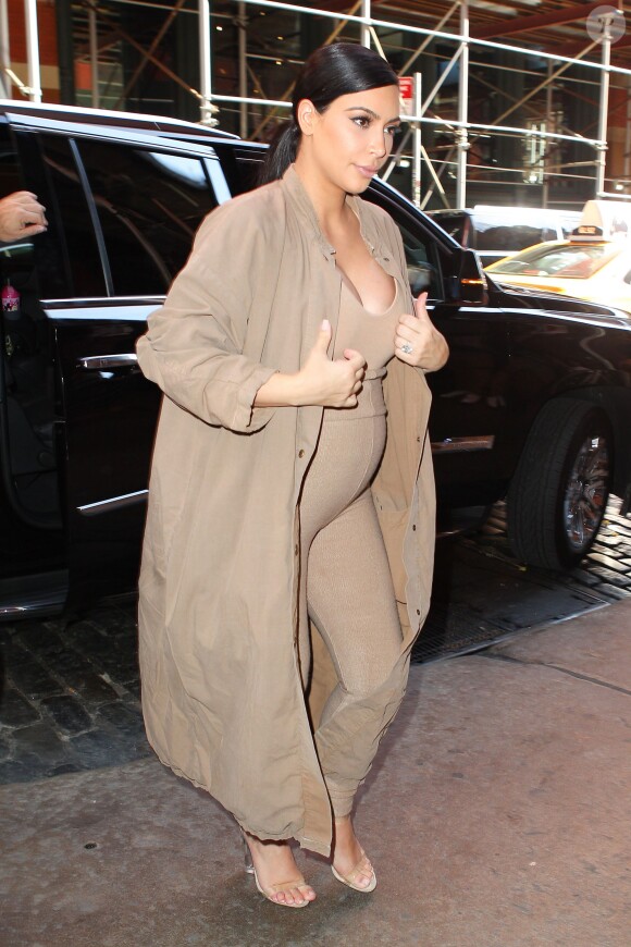 Kim Kardashian, Kanye West et leur fille North à New York, le 16 septembre 2015.