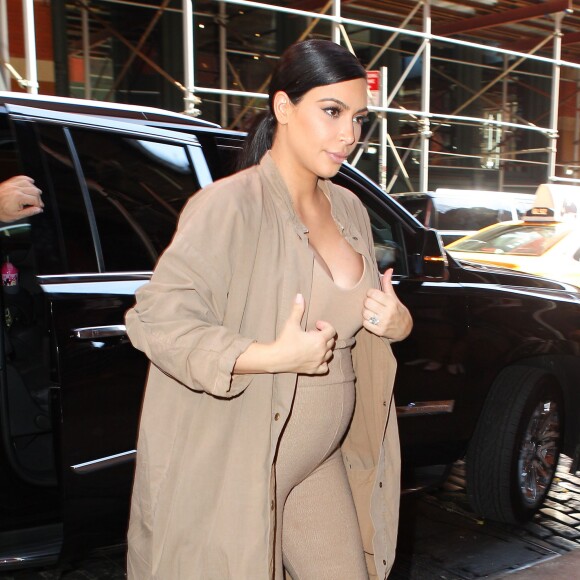 Kim Kardashian, Kanye West et leur fille North à New York, le 16 septembre 2015.