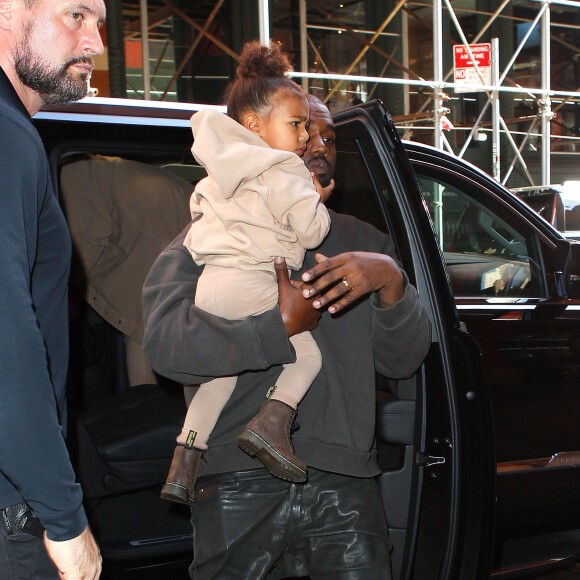 Kim Kardashian, Kanye West et leur fille North à New York, le 16 septembre 2015.