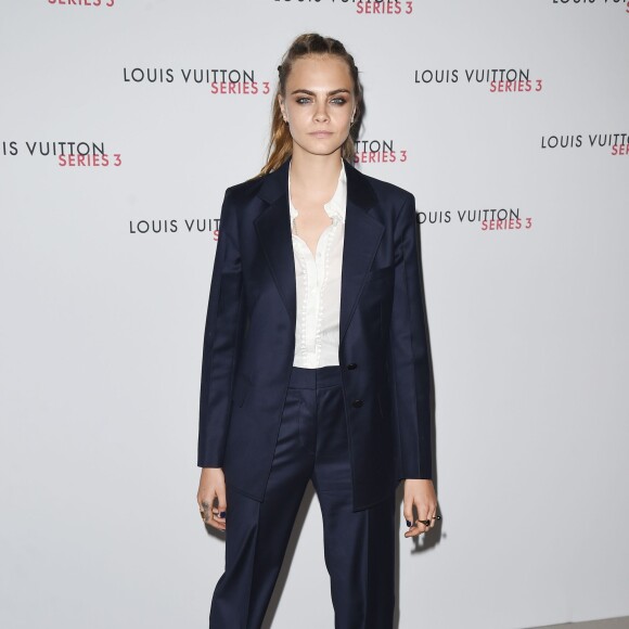 Cara Delevingne assiste au vernissage de l'exposition "SERIES3" de Louis Vuitton. Londres, le 20 septembre 2015.
