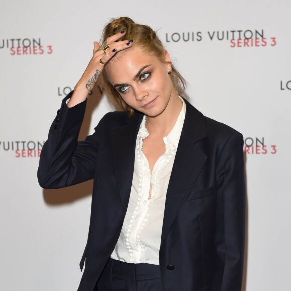 Cara Delevingne assiste au vernissage de l'exposition "SERIES3" de Louis Vuitton. Londres, le 20 septembre 2015.