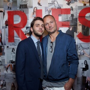 Xavier Dolan et le photographe Juergen Teller assistent au vernissage de l'exposition "SERIES3" de Louis Vuitton. Londres, le 20 septembre 2015.