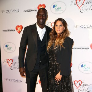 Omar Sy et sa femme Hélène lors du "Par Coeur Gala" pour les 10 ans de l'association "Cekedubonheur" au pavillon d'Armenonville à Paris le 24 septembre 2015