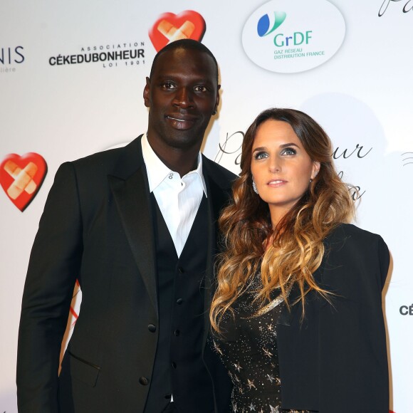 Omar Sy et sa femme Hélène lors du "Par Coeur Gala" pour les 10 ans de l'association "Cekedubonheur" au pavillon d'Armenonville à Paris le 24 septembre 2015