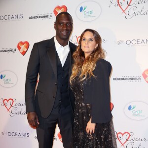 Omar Sy et sa femme Hélène lors du "Par Coeur Gala" pour les 10 ans de l'association "Cekedubonheur" au pavillon d'Armenonville à Paris le 24 septembre 2015