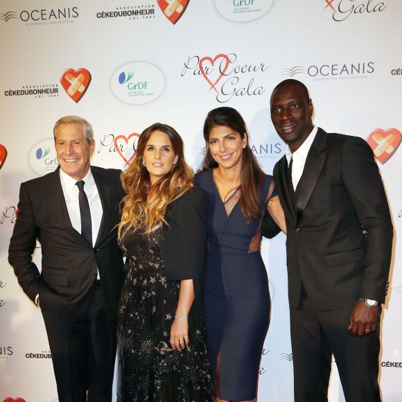 Jean-Claude Darmon, Hélène Sy, Hoda Roche et Omar Sy lors du "Par Coeur Gala" pour les 10 ans de l'association "Cekedubonheur" au pavillon d'Armenonville à Paris le 24 septembre 2015